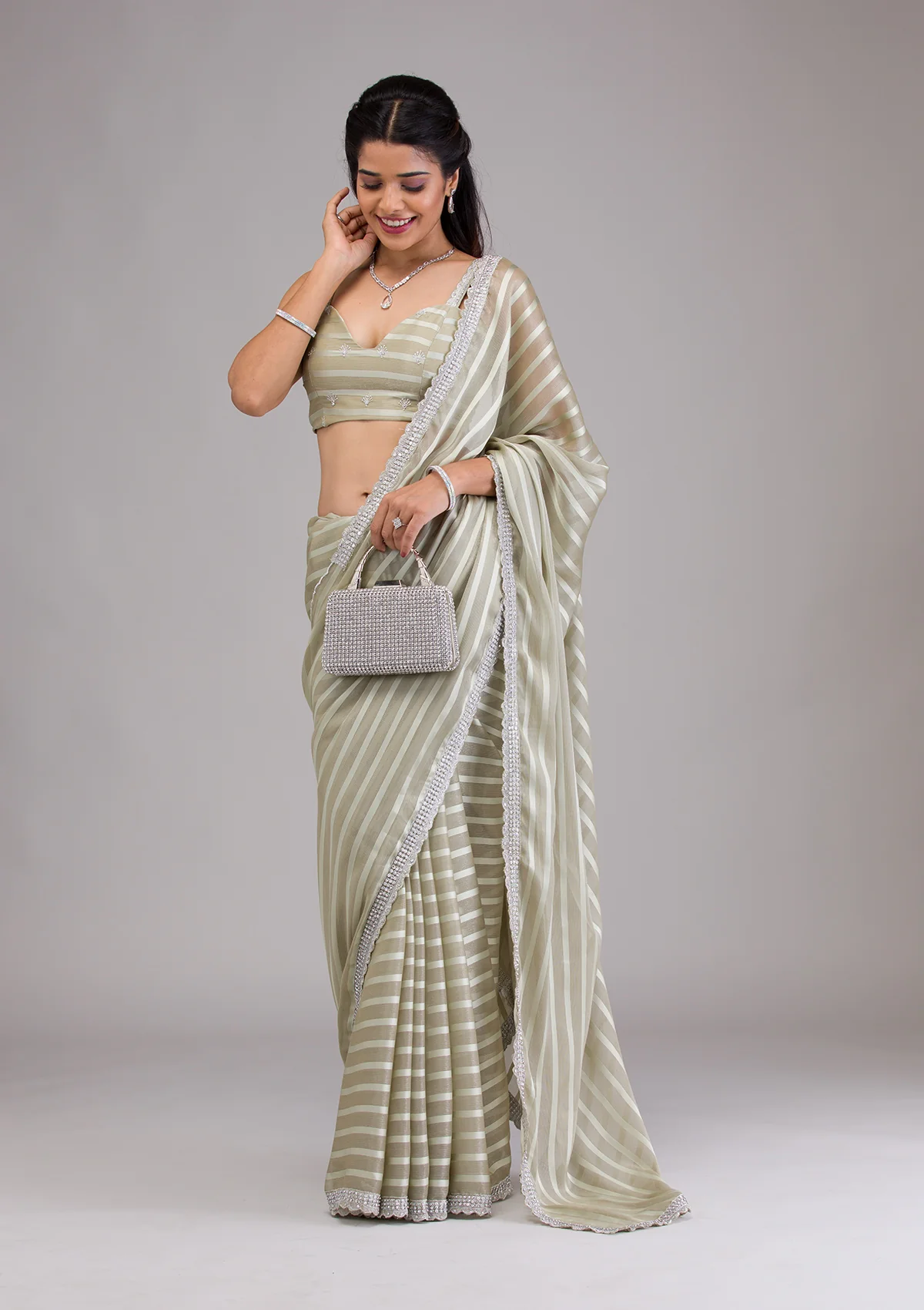 koskii-pistagreen-stonework-semicrepe-designer-saree-saus0034452_pistagreen_1_7.webp Pista Green Stonework Semi Crepe Saree - Image 1